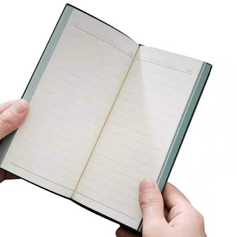 pocket size notebook , wide ruled inner paper